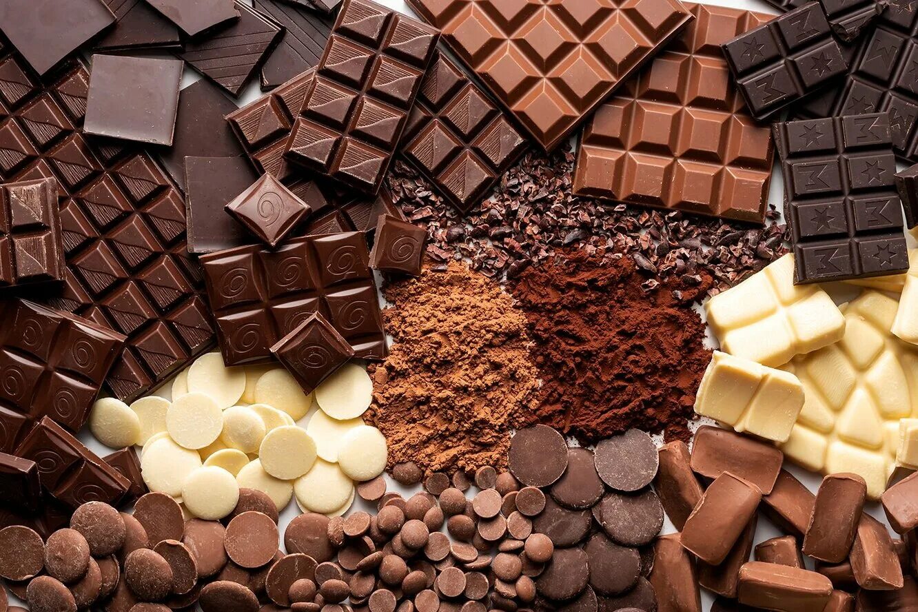 1 кусочек шоколада. Шоколад. Бельгийский шоколад. Разнообразие шоколада. Конфеты шоколад.