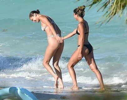 BELLA HADID in Bikini at a Beach in Turks and Caicos 08/12/2016.