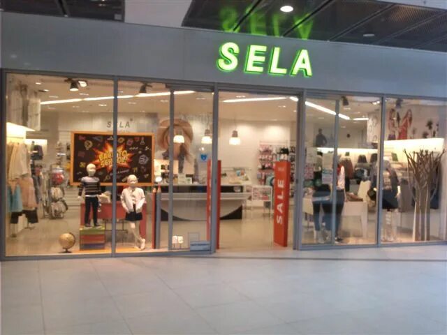 Магазин sela moms monsters спб. Sela пенза. Вывеска sela. Магазин sela. Магазин sela.