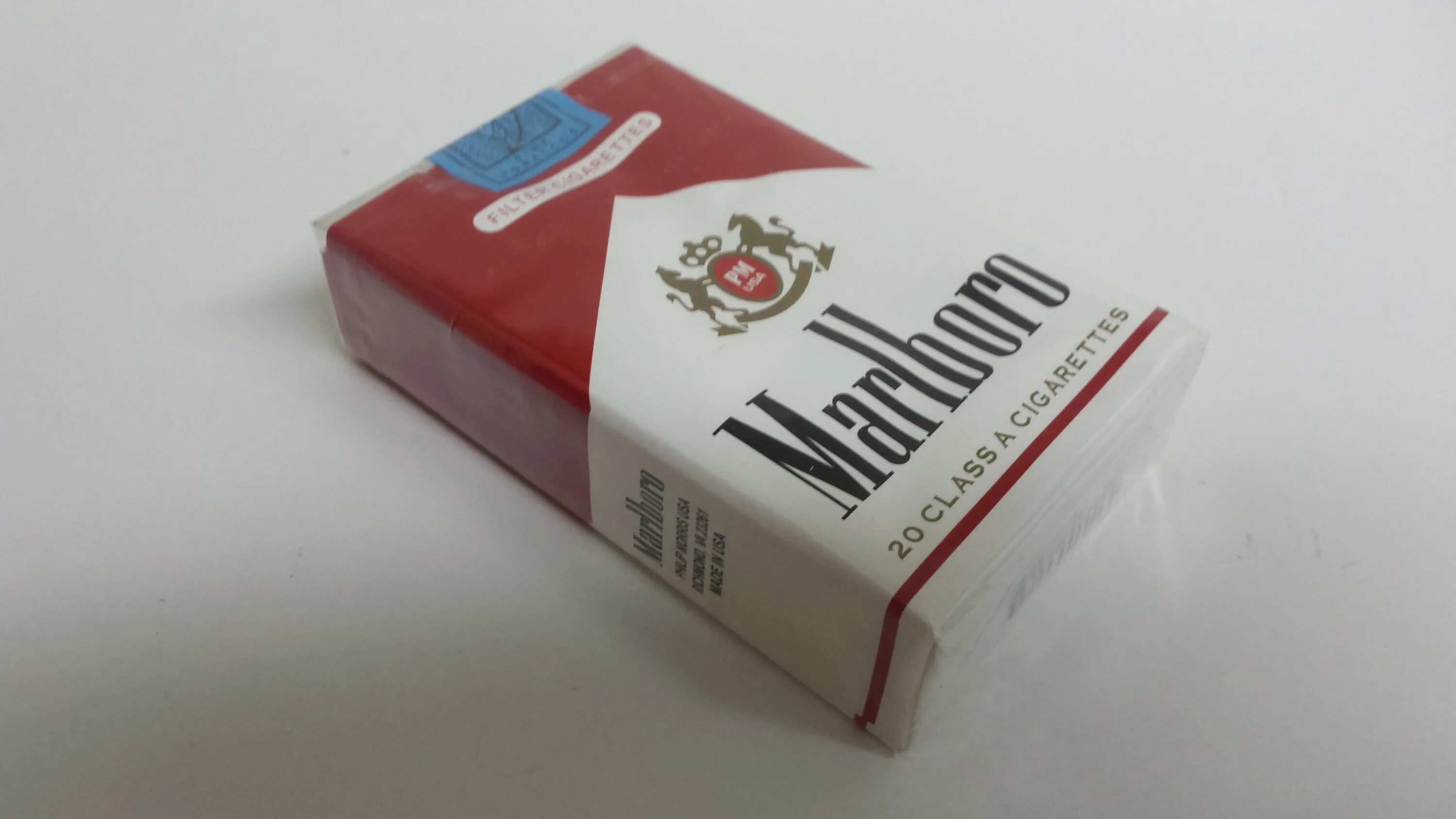 Пачка н. Сигареты Мальборо 80 годов. Сигареты Мальборо 90-х. Сигареты Marlboro СССР. Marlboro пачка 2000.