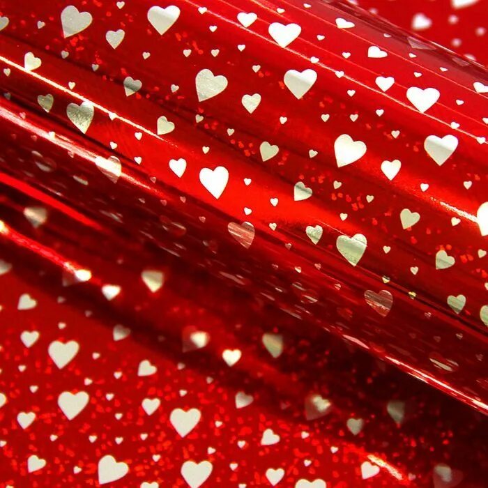 Пленка для подарков купить. Пленка голография "сердечки", красный, 70 х 100 см. Бумага упаковочная. Бумага Оберточная. Упопоковочная бумага.