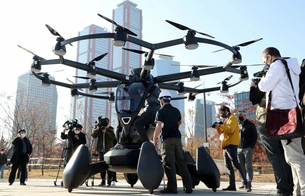 БПЛА аэротакси. Аэротакси Южной Кореи. Шоу дронов Корея. Летающий аппарат для человека.