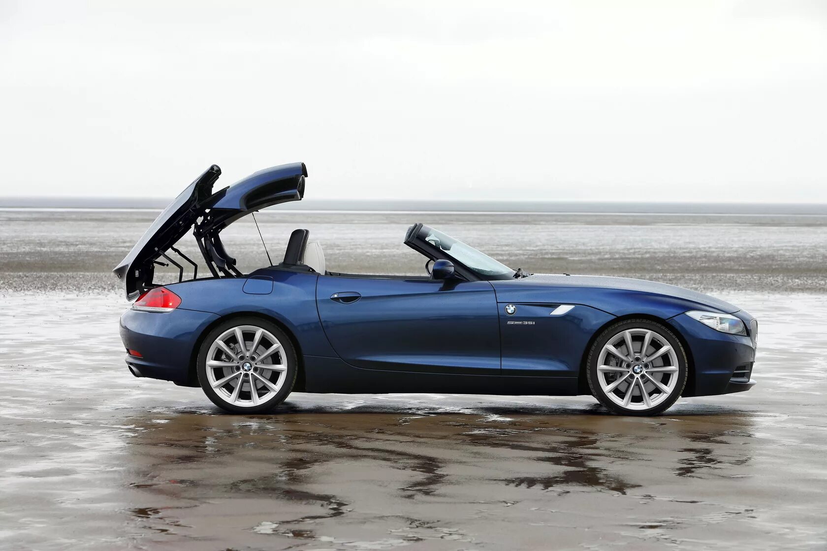 BMW кабриолет z4 Roadster. BMW z4 2010. БМВ z4 купе кабриолет. БМВ z4 родстер черный 2021. Бмв двухместная