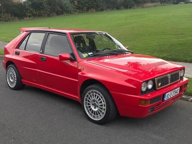 Лянча против феррари. Лянча Дельта интеграле эволюцион. Lancia Delta HF integrale EVO Rally. Лянча Дельта 1982-1991. Wheels Lancia Delta HF.