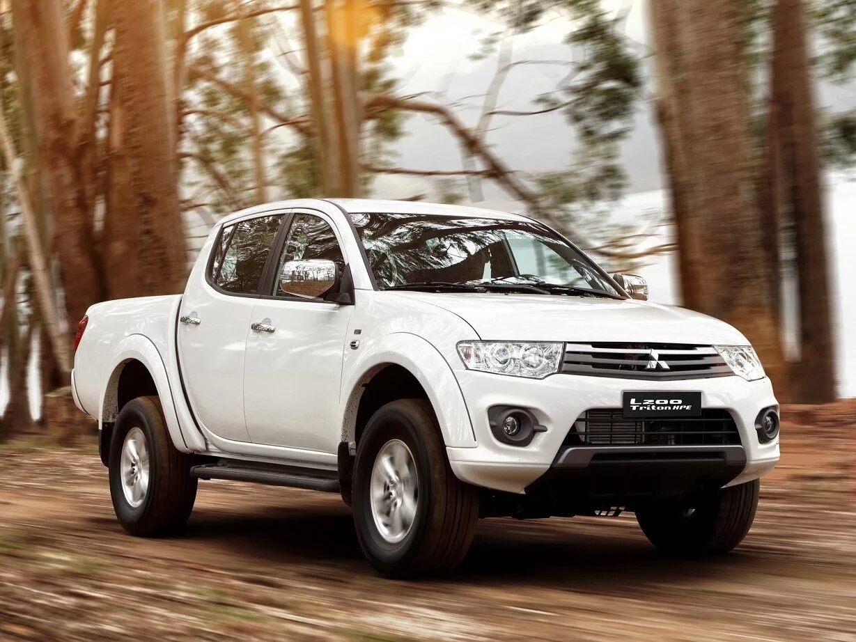 Пикапы mitsubishi l200. Мицубиси л200. Митсубиси l200. Mitsubishi l200 внедорожник. Джип Митсубиси л200.