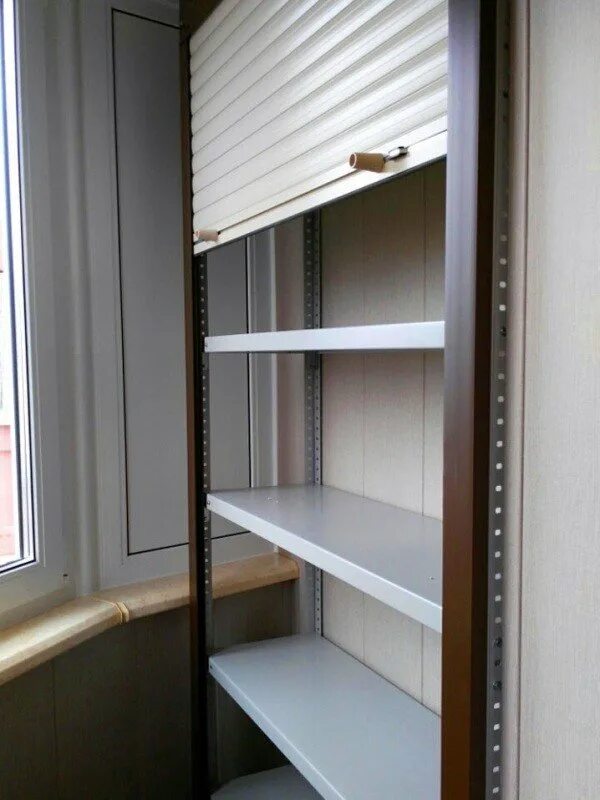 Стеллаж для балкона купить. Шкаф с рольставнями металл 45х53х100. Стеллаж на балкон Леруа Мерлен. Стеллаж на балкон. Шкаф стеллаж на балкон.