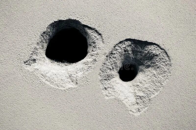 Concrete bulletholes. Hole in a Cement Wall. Bullethole on Concrete Decal. Brick Bullet holes.