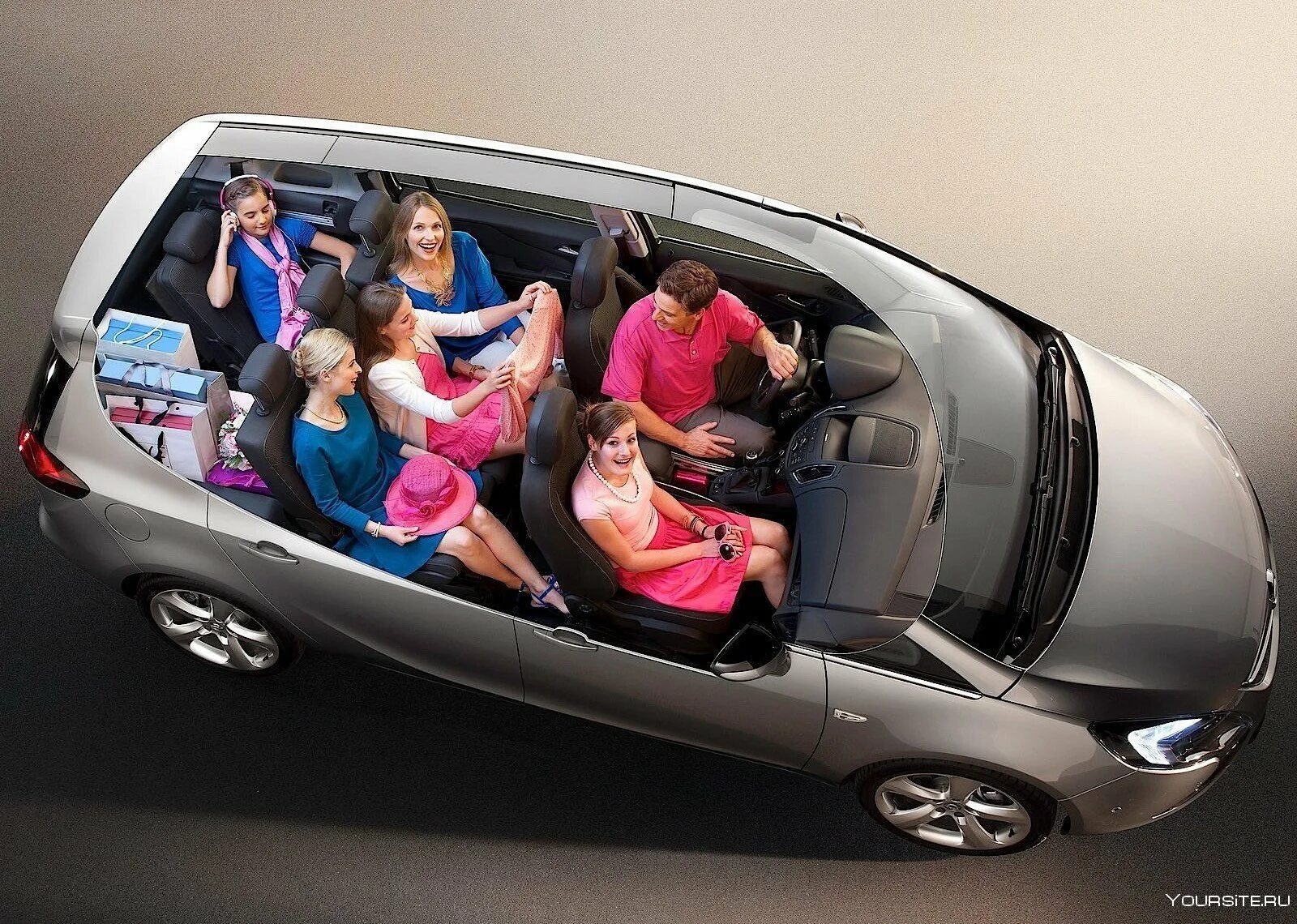 Топ семейных автомобилей. Opel Zafira Tourer 2012. Opel Zafira 7 местный. Опель Зафира 7 мест. Опель Зафира семи меска.