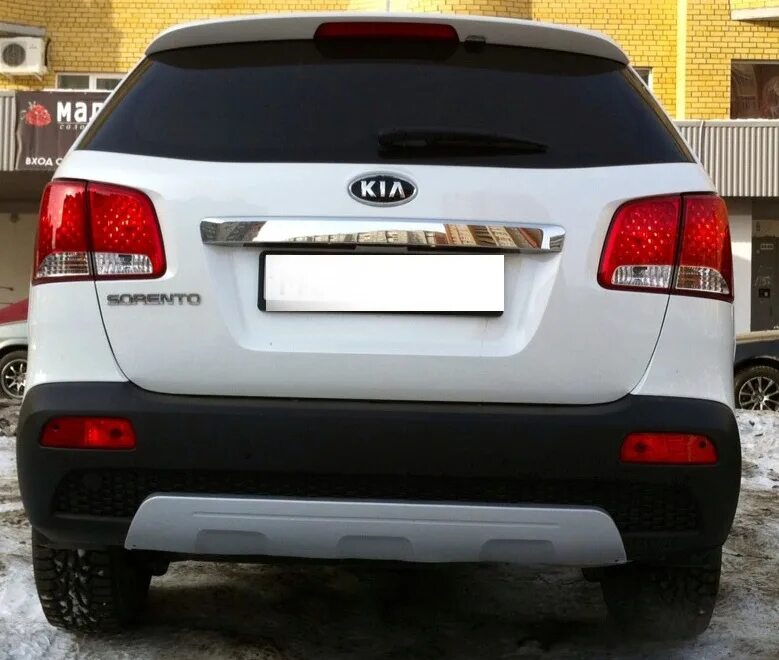 Заднее бампер киа соренто купить. Kia Sorento 2 XM накладка на бампер. Kia Sorento 2014 накладки. Kia Sorento 2 дорестайлинг. Kia Sorento задний бампер.