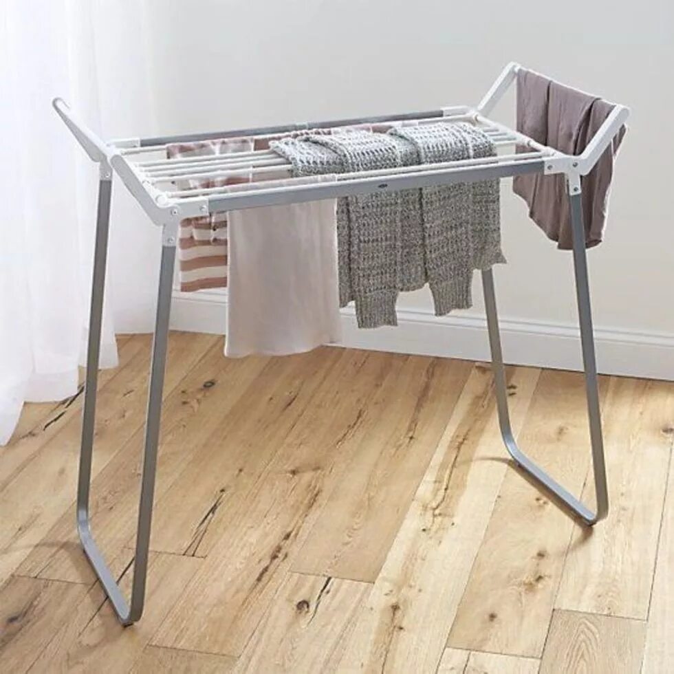 Сушилка для белья mpd2250x0. Сушилка для белья на стену. Компактные сушилки для белья в квартире. Лаундри рум. Сушилка раскладная 1100х720х1700.