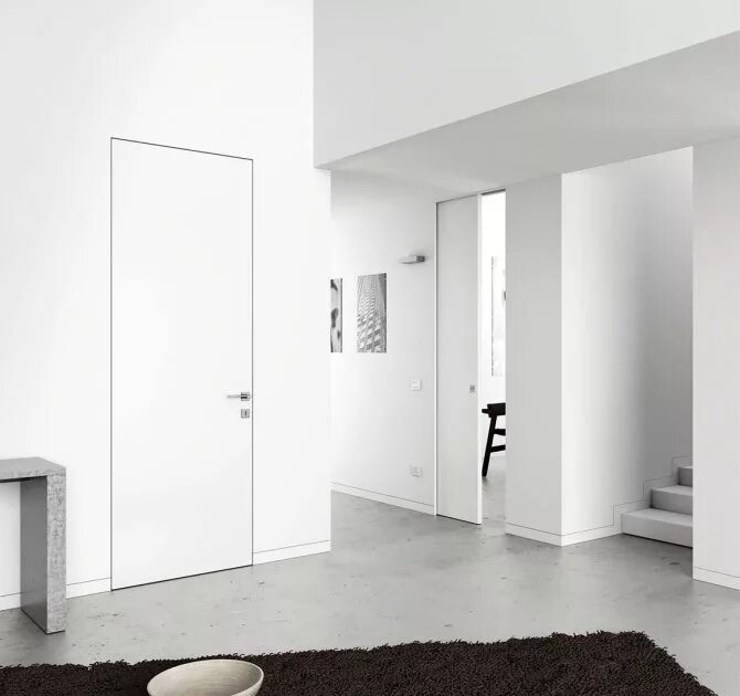 Двери без наличников. Двери без наличников. Двери заподлицо без наличников. Инвизибл профиль дорс черная. Межкомнатные двери без коробки.