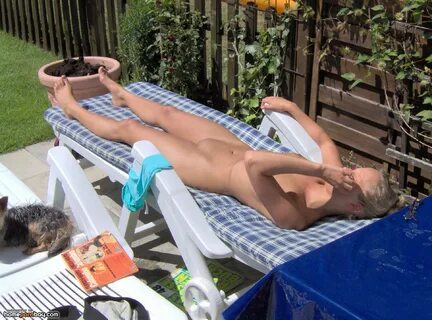 Miranda sunbathing naked.