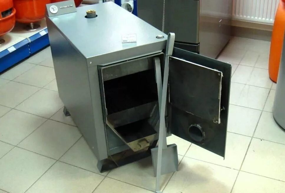 Эван warmos tt-18. Твердотопливный котел эван. Твердотопливный котел warmos tk - 9. Котел фармос твердотопливный с датчиком. Котел эван warmos tt 25k.