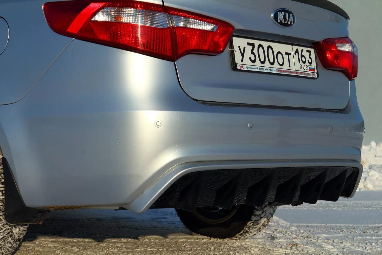 Диффузор рио 3. Kia rio 3 диффузор заднего бампера. диффузор киа рио 3. диффузор на задний бампер киа рио 3 седан. диффузор заднего бампера киа рио 3.