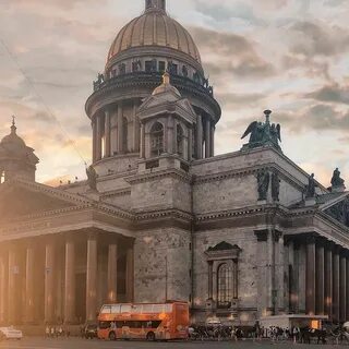 May be an image of one or more people, monument and buildings. 