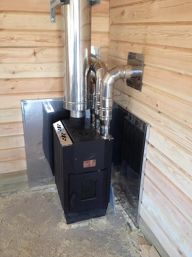 Печь отопительно-варочная tmf огонь-батарея 9 антрацит. Печь в интерьере загородного дома. Очаг алтай. Жарпарком. Печка с камином в деревянном доме.