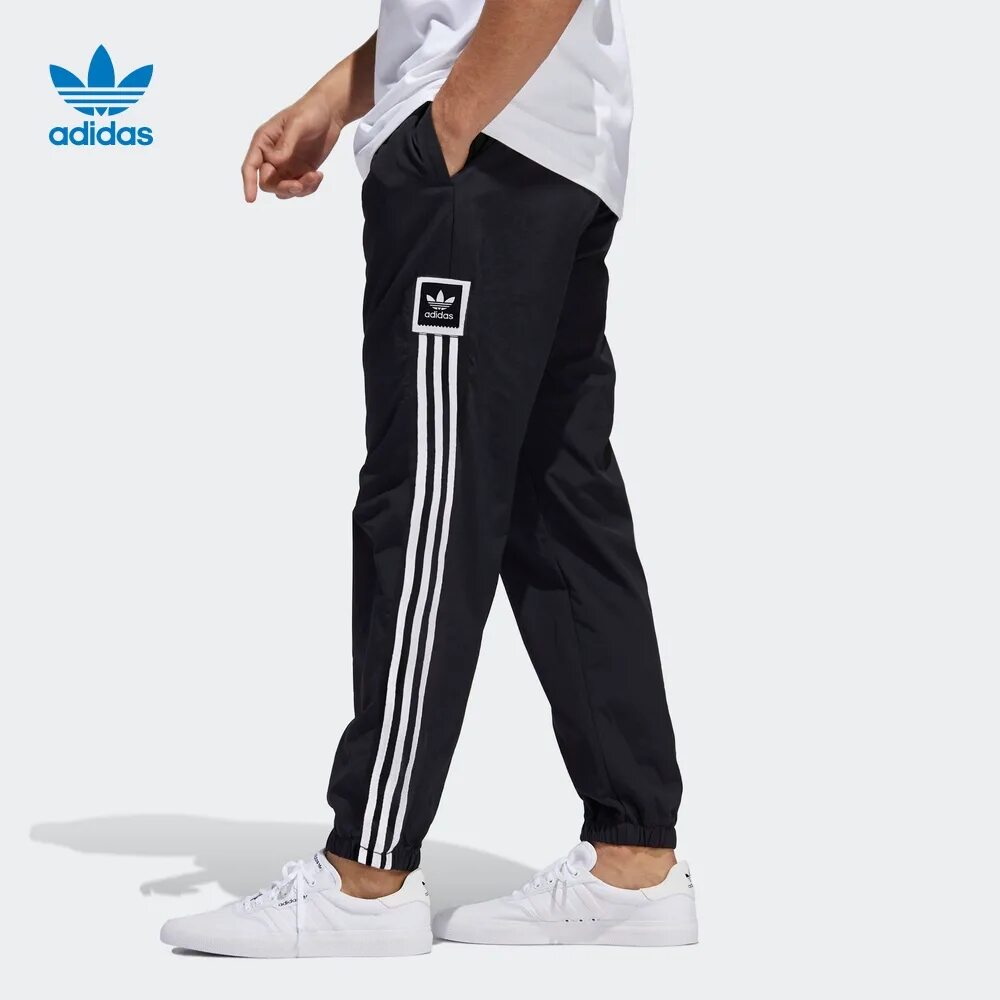 Брюки спортивные adidas Originals fm9896. Брюки спортивные adidas Originals track Pants. Штаны адидас Ориджиналс. Штаны adidas Originals Wind track.