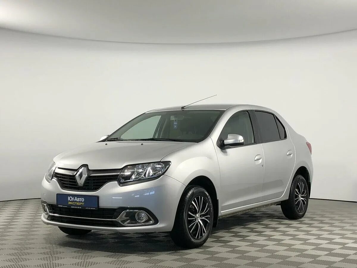 Renault logan годы выпуска. Renault Logan II 2015. Рено Логан 2015. Рено Логан 2 2015. Ренаулт Логан серый.