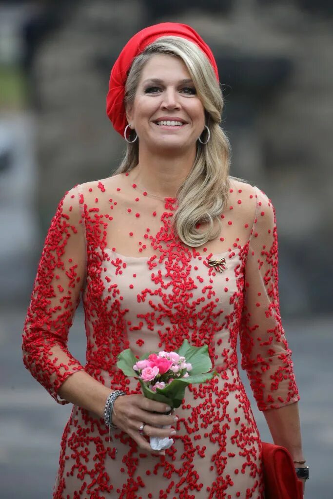 Maxima of the Netherlands dazzles in a stylish white sweater Queen maxima, Queen