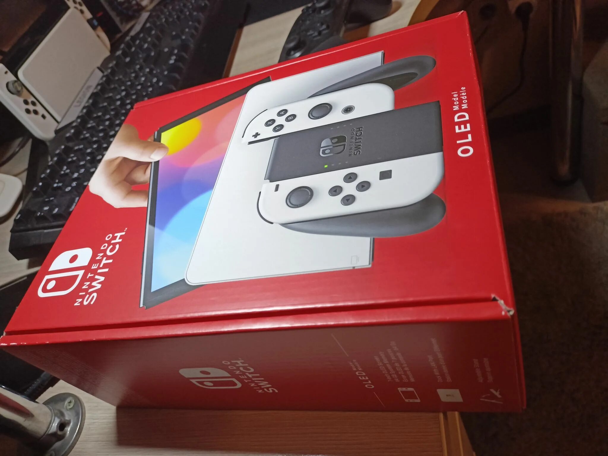 Nintendo спб. Игровая приставка Nintendo Switch OLED. Nintendo Switch OLED белый. Nintendo Switch OLED 64 ГБ белый. Nintendo Switch OLED model белая.