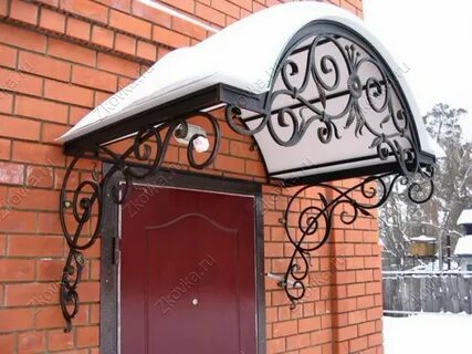 Кованые козырьки над входом