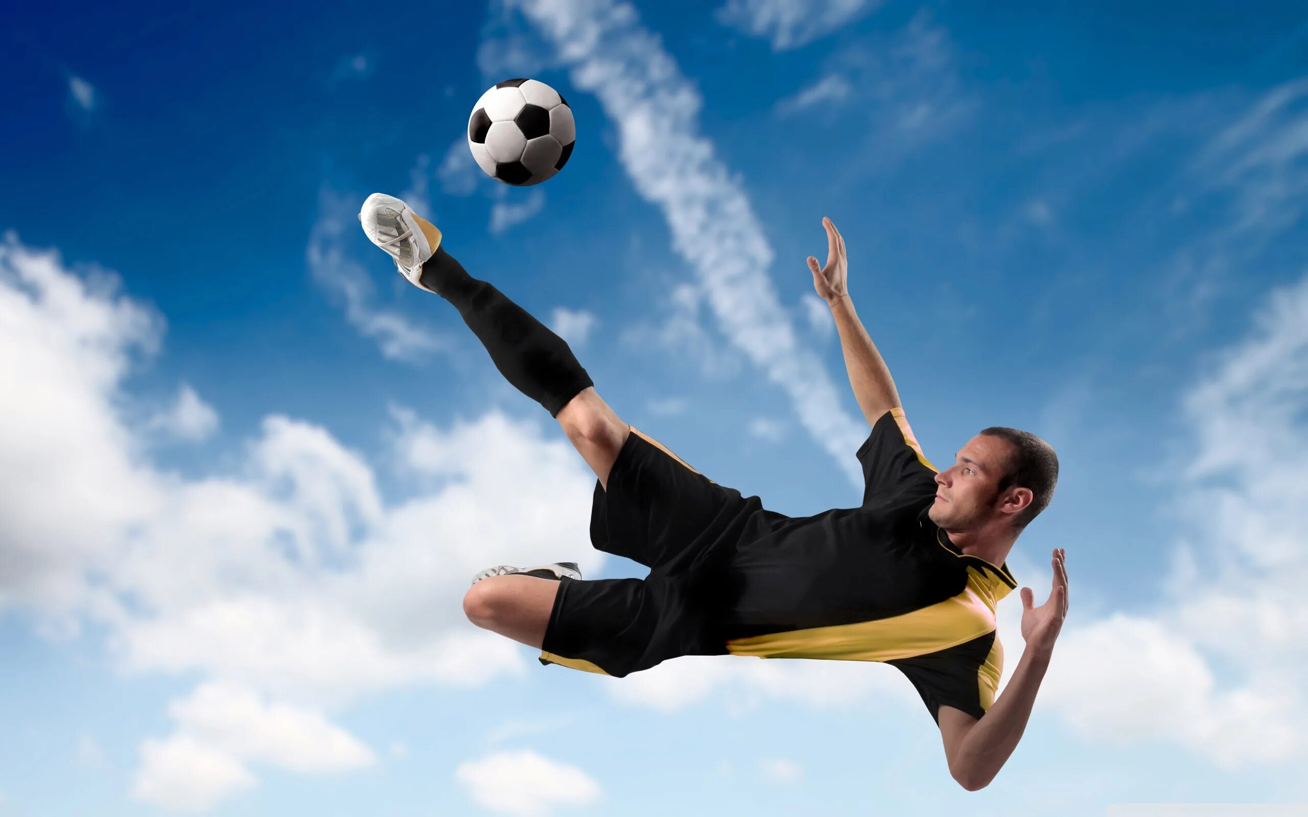 Peter started to play football because. Спортсмены. Футболист пинает мяч. Футбол фото. Удар по мячу.