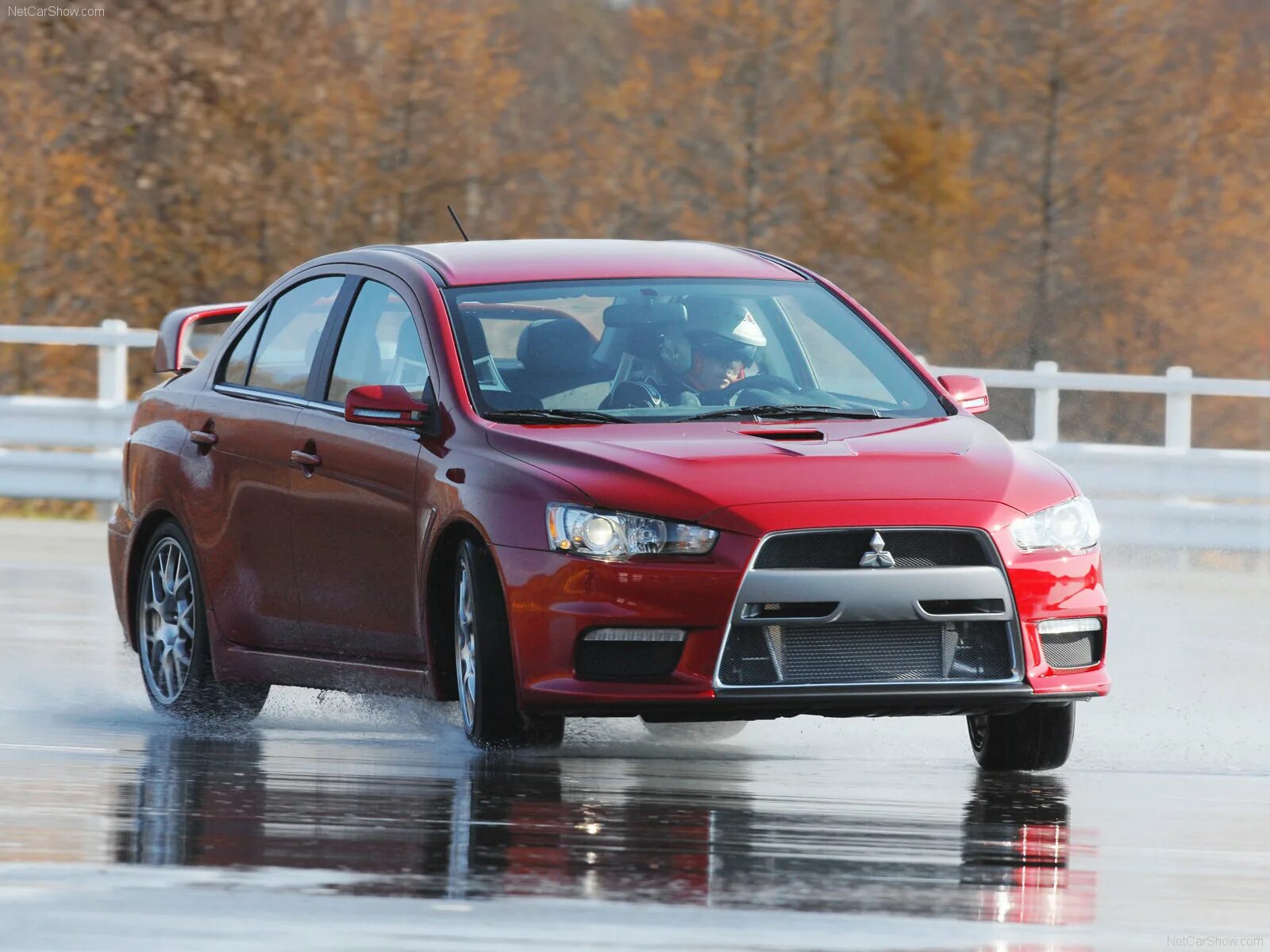 Машина митсубиси лансер 10. Митсубиси лансер 10 2008. Митсубиси лансер эволюшн 10 красный. Митсубиси под. Митсубиси паджеро 3.