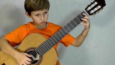 Учиться играть на гитаре детям