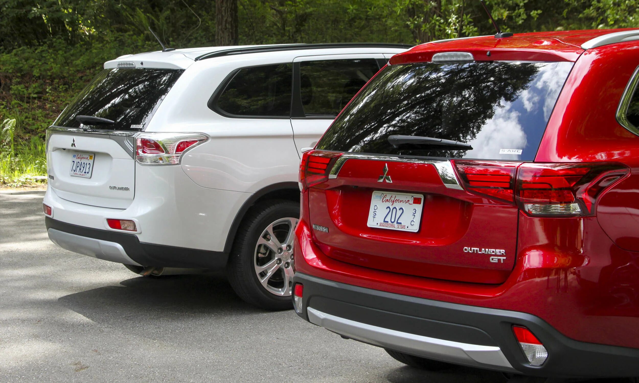 Аутлендер 2024 купить. Митсубиси Аутлендер 2015 зад. Mitsubishi Outlander 2014 года зад.