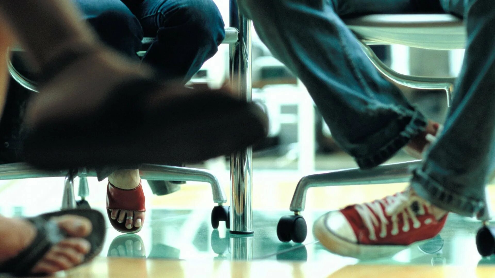 Foot under table. Feet under Chair. Bare feet under the Chair. Shoes on the Table. Feet on Table.