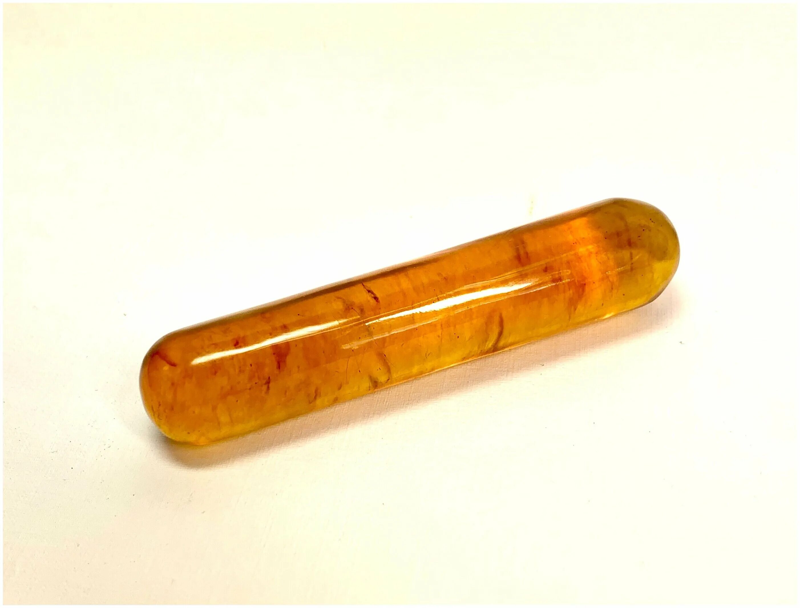 массажные палочки из янтаря. янтарные палочки. янтарные палочки. янтарные палочки. янтарная палочка для массажа лица.