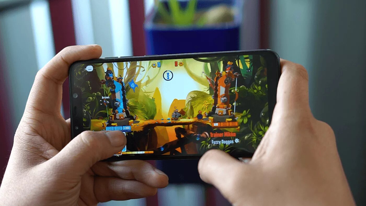 Смартфоны тянущие игры. Игровой смартфон в руках. игры на смартфон. игры на смартфон андроид 2025. смартфоны android игры.