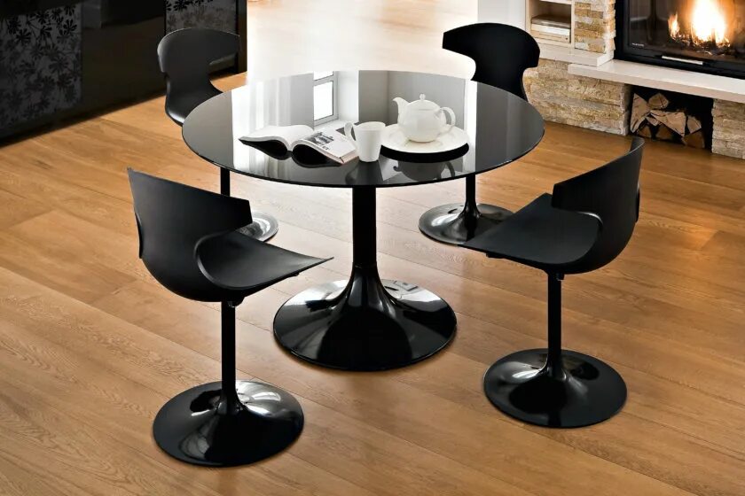 Темные кухонные столы. Стол Тулип черный 100. Круглый стол в интерьере. Стол круглый черный. Стол на кухню.