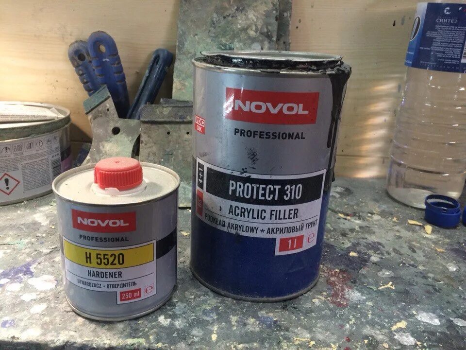 Какой грунт выбрать для авто. Лак для бампера автомобиля. acrylic filler novol. покраска и грунт автомобиля грунтовка. стенд для покраски бампера автомобиля.
