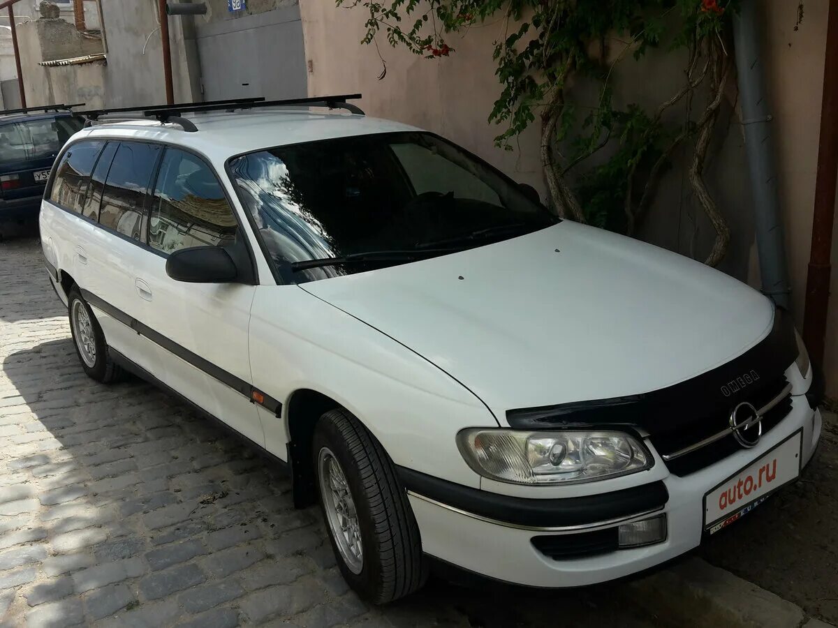 опель омега 1993 белый. дверона омега снежная лиственница. опель омега б 2. омега speedmaster 1920 год. омега белая.