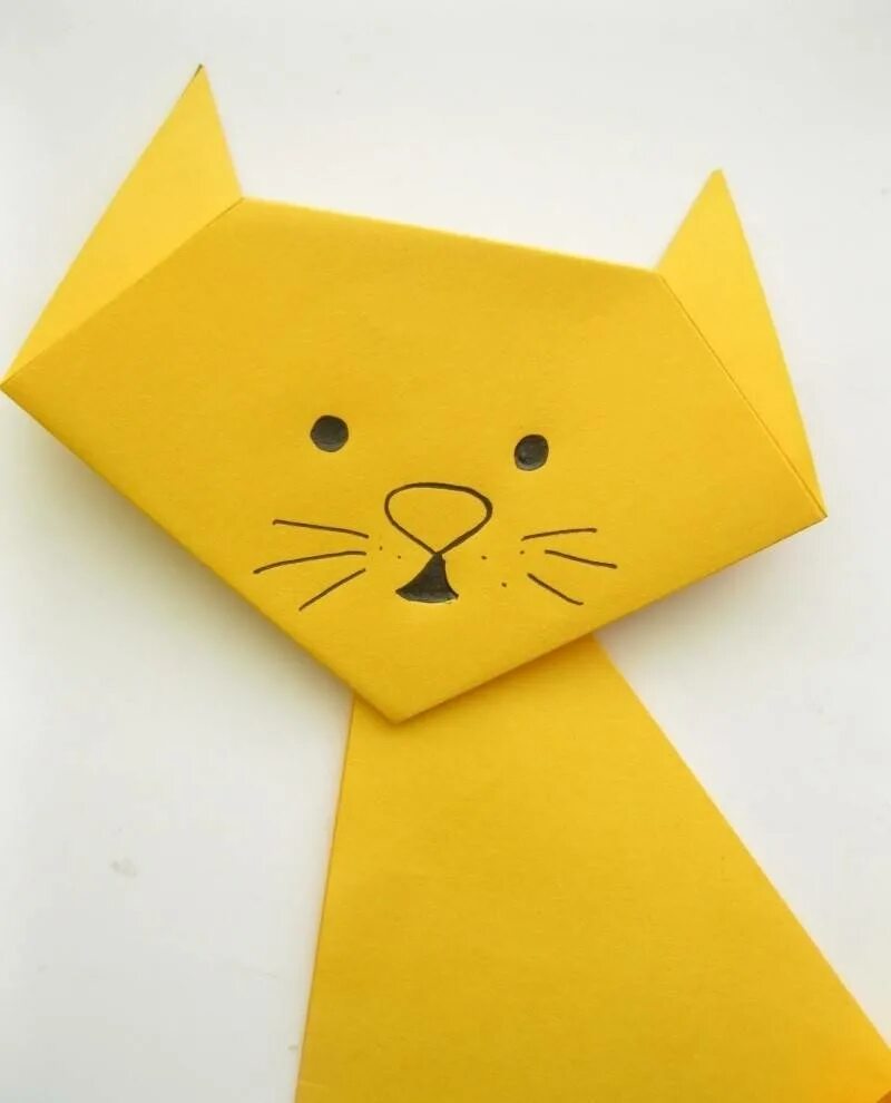 Оригами кошка. Поделка котик из бумаги. Поделки из бумаги котики оригами. Оригами кошка из бумаги для детей. Бумажные кошечки