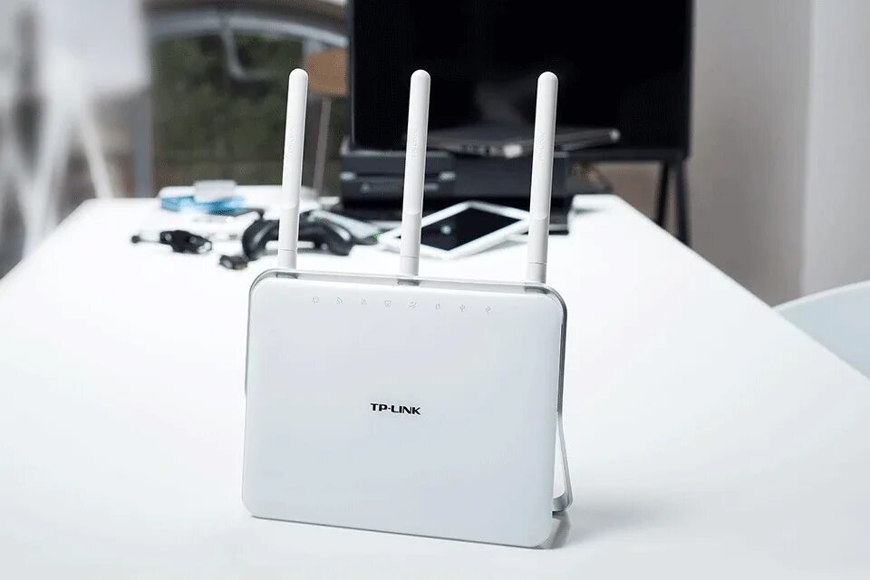 Openwrt tp link archer c80. Tp link archer c9 ac1900. роутер 2400 мгц. роутер вид сверху.