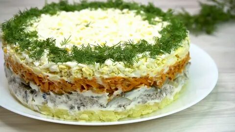 Рецепт салата с шпротами и яйцами огурцом