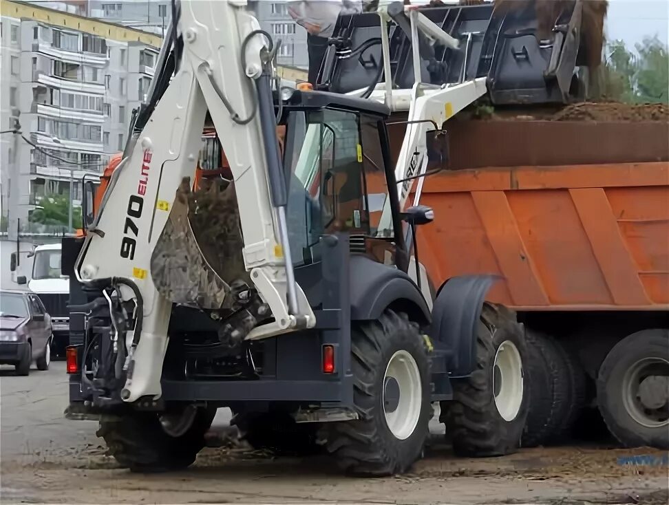 Аренда экскаватора погрузчика vyvoz musora24. Терекс 8. Терекс 970 Элит 2008. Terex 970 Elite двигатель. Экскаватор Терекс на колесах.