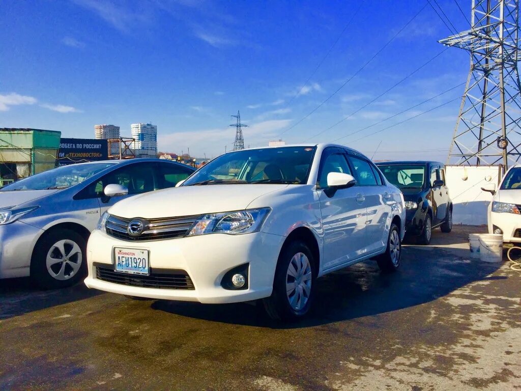 Купить автомобиль с пробегом во владивостоке. Тойота Аксио 2014 года. Axio 4wd. Corolla Axio Владивосток. Каролла Тойота Владивосток.