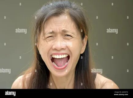 An Angry Asian Person Stock Photo. 