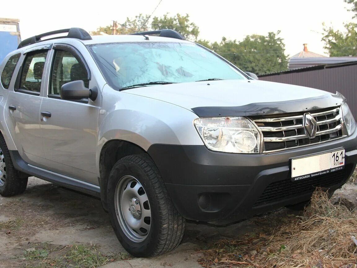 Купить дастер в ростовской области. Рено Дастер 2014 серебро. Renault Duster 2014. Дастер 102 лс. Рено джип 2014.