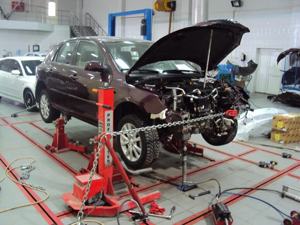 Стапельные работы. Grabber стапель. Исправление геометрии кузова на стапеле. Стапель для правки кузова. Рихтовка автомобиля.