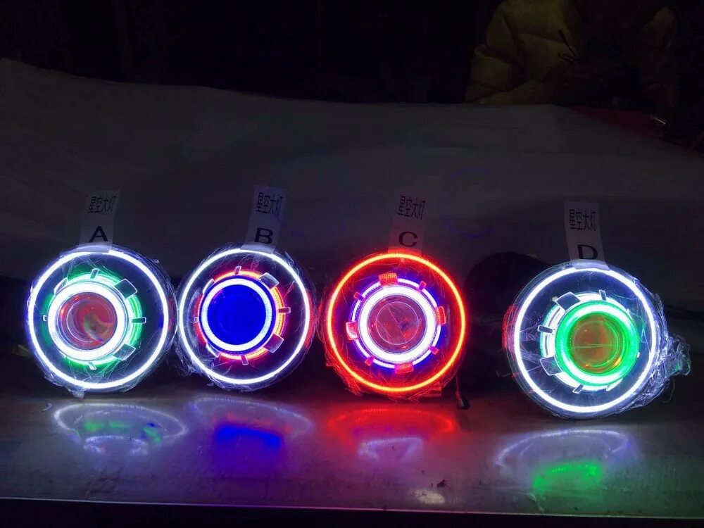 Led фары bmw e92. Кольцо проектор. Линзы с подсветкой на авто. Светодиодная наклейка глаз дьявола. Красная подсветка в линзах.
