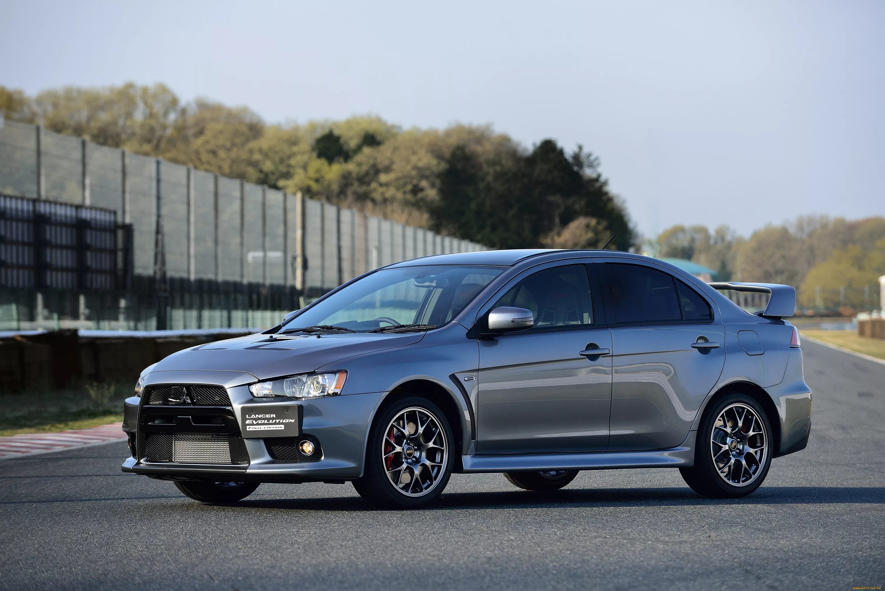 Mitsubishi Lancer Evolution 10. Mitsubishi EVO 10. Митсубиси Лансер 10 EVO. Mitsubishi Lancer Evolution 10 2015.