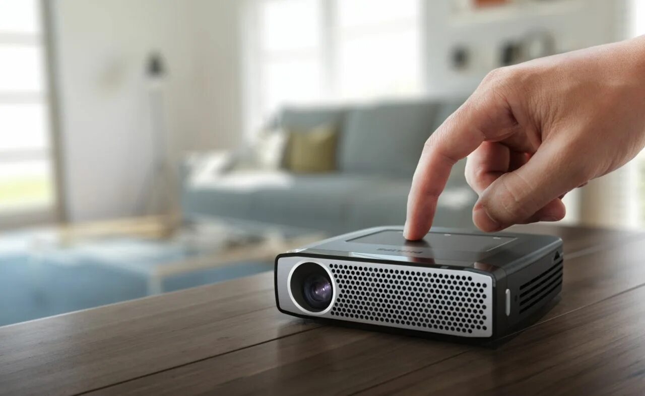 Подключить мини проектор. Проектор Philips PPX-2330. Philips i5 Projector. Проектор Brookstone Pocket Projector Pro DLP Intellibright-200 Lumens. Smart Projector.