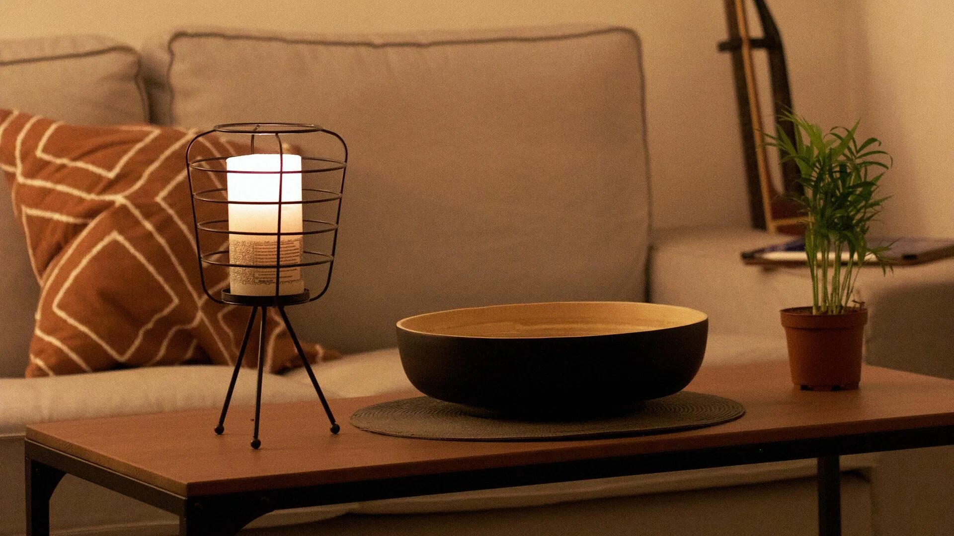 The lamp is in the table