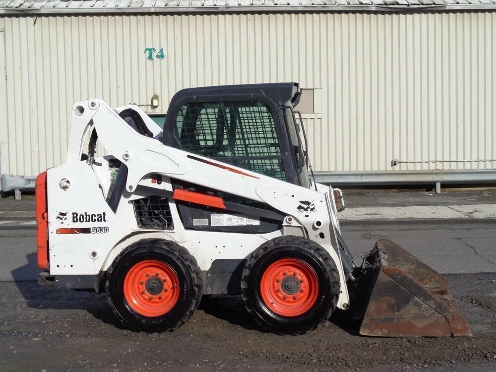 Bobcat 530. Погрузчик Бобкэт s530. Мини-погрузчик Bobcat s530. Бобкэт 530. Фронтальный погрузчик Бобкэт с 530.