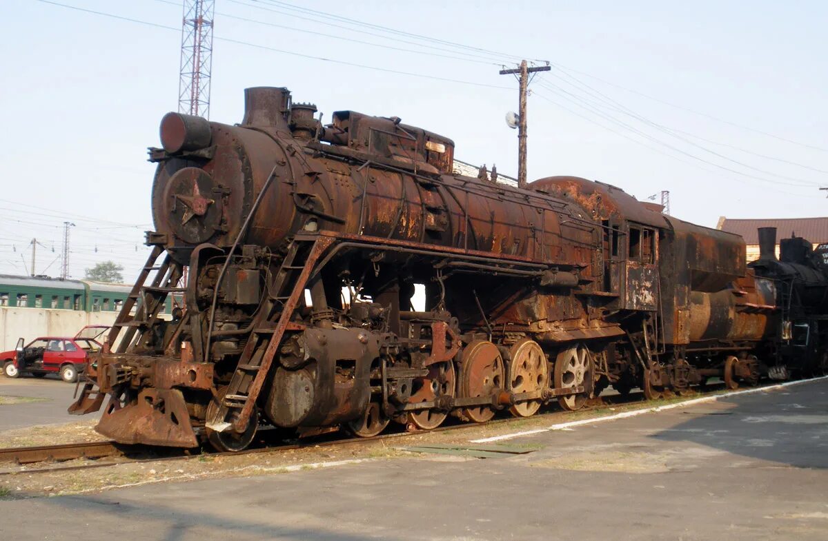 тендер паровоза. паровозный тендер. тендер паровоза л. вагон для угля для паровоза. л тендер.