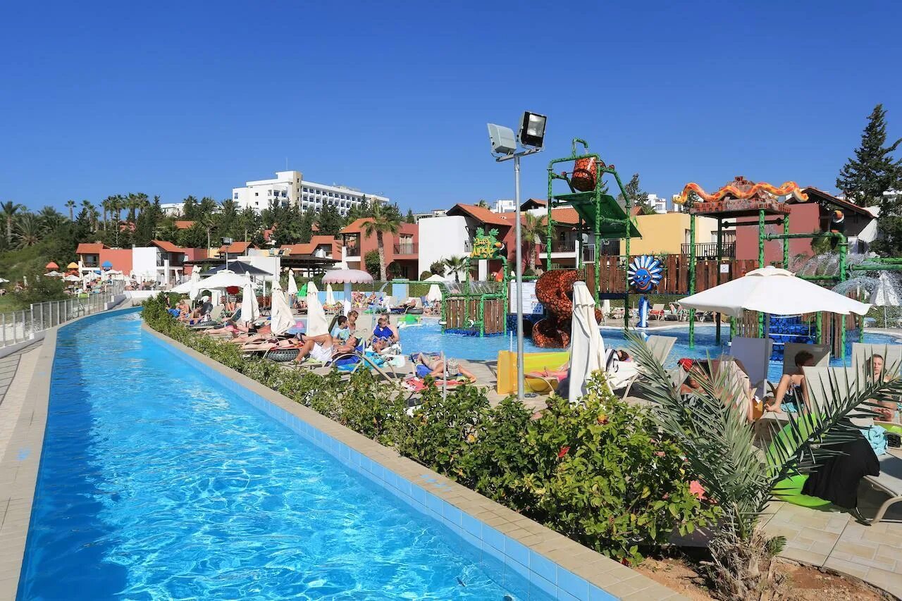 Aqua village. Aqua Sol Кипр. Кипр Холидей Виладж Пафос. Аква Виладж. Aqua Sol Holiday.